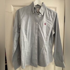 Brooks Brothers women’s cut bluish/grey Oxford style shirt.
